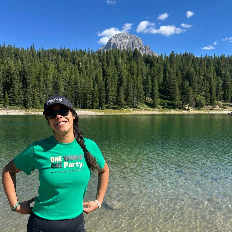 A friend in a Party. cap by a mountain lake