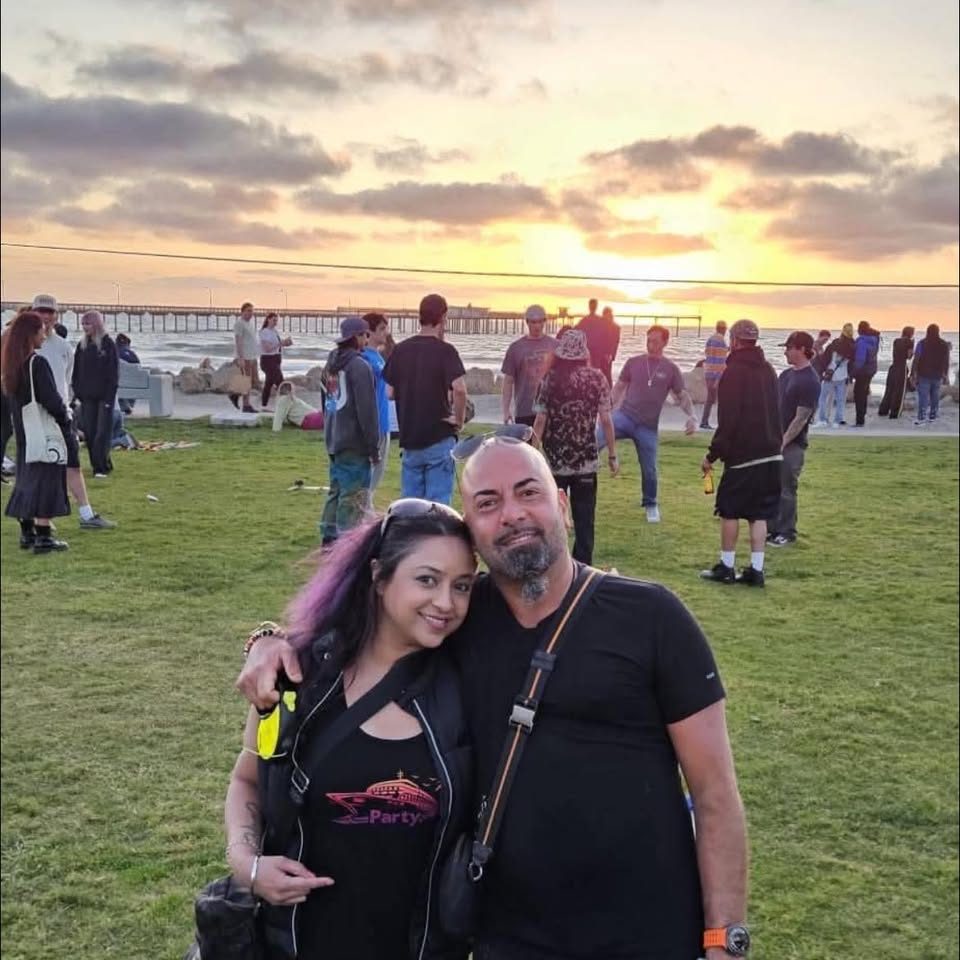 Friends in Party. merch at a sunset hang