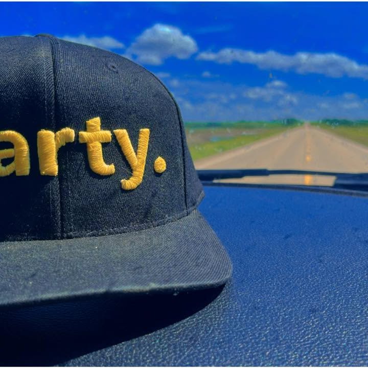 Party. cap along an open road